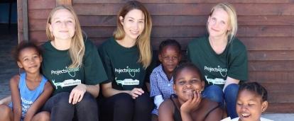 Teenagers spend time working with children during their volunteer project in South Africa Teenagers volunteering with children on one of Projects Abroad's programmes in South Africa